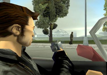 A screenshot Grand Theft Auto III (PlayStation 2 pre-release), demonstrating the capability to perform drive-by shooting. GTA is the largest entertainment title ever.